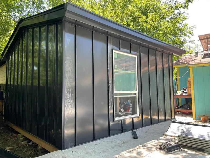 Black standing seam metal wall panels for Roof Inspection in Southbury