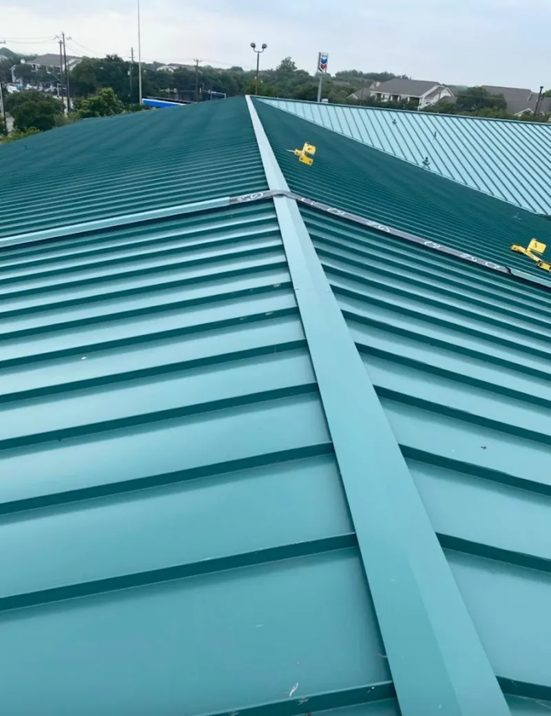 Green commercial metal roof ridge and valley for Metal Roof Repair in Southbury